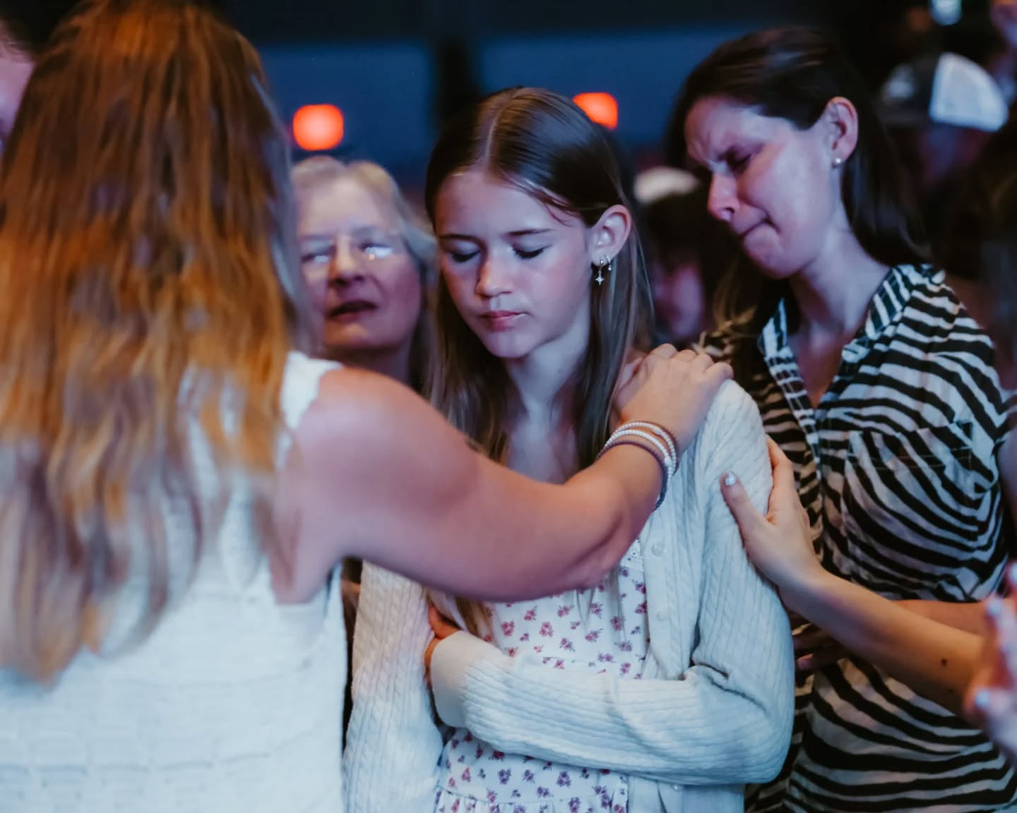 Prayer and ministry moment at To·Gather