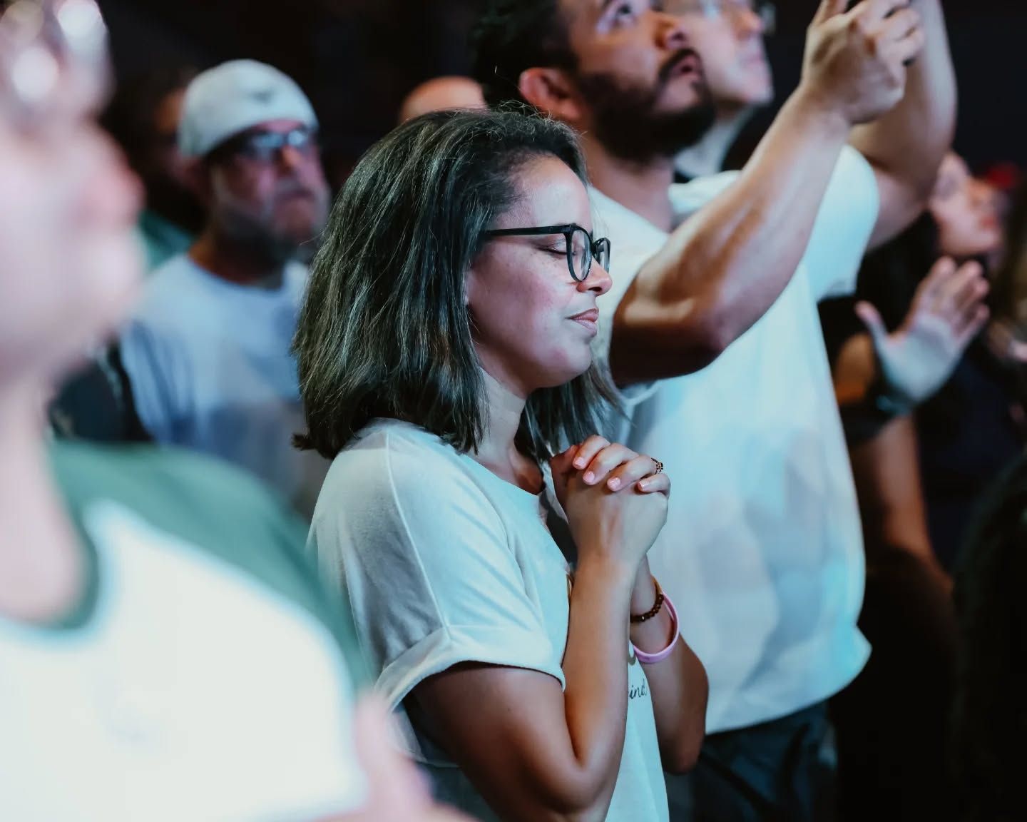 Worshipper praying at To·Gather